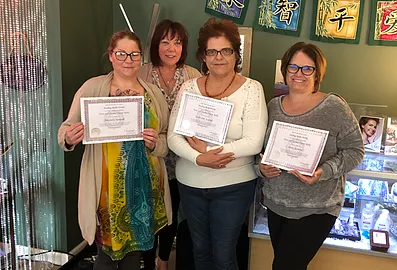 A group of people with certificates